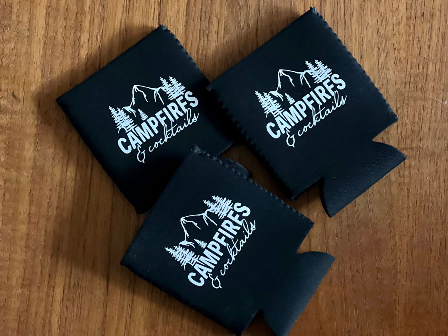 Campfire & cocktails Koozie - www.Shopthatapp.com