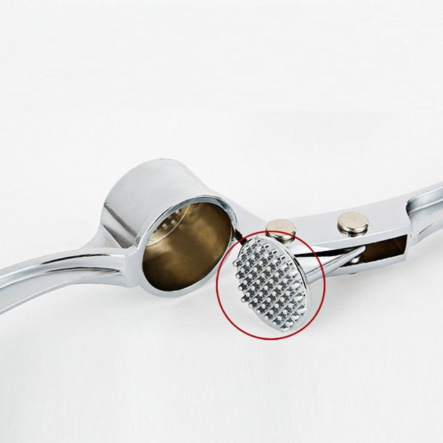 Garlic Crusher - www.Shopthatapp.com