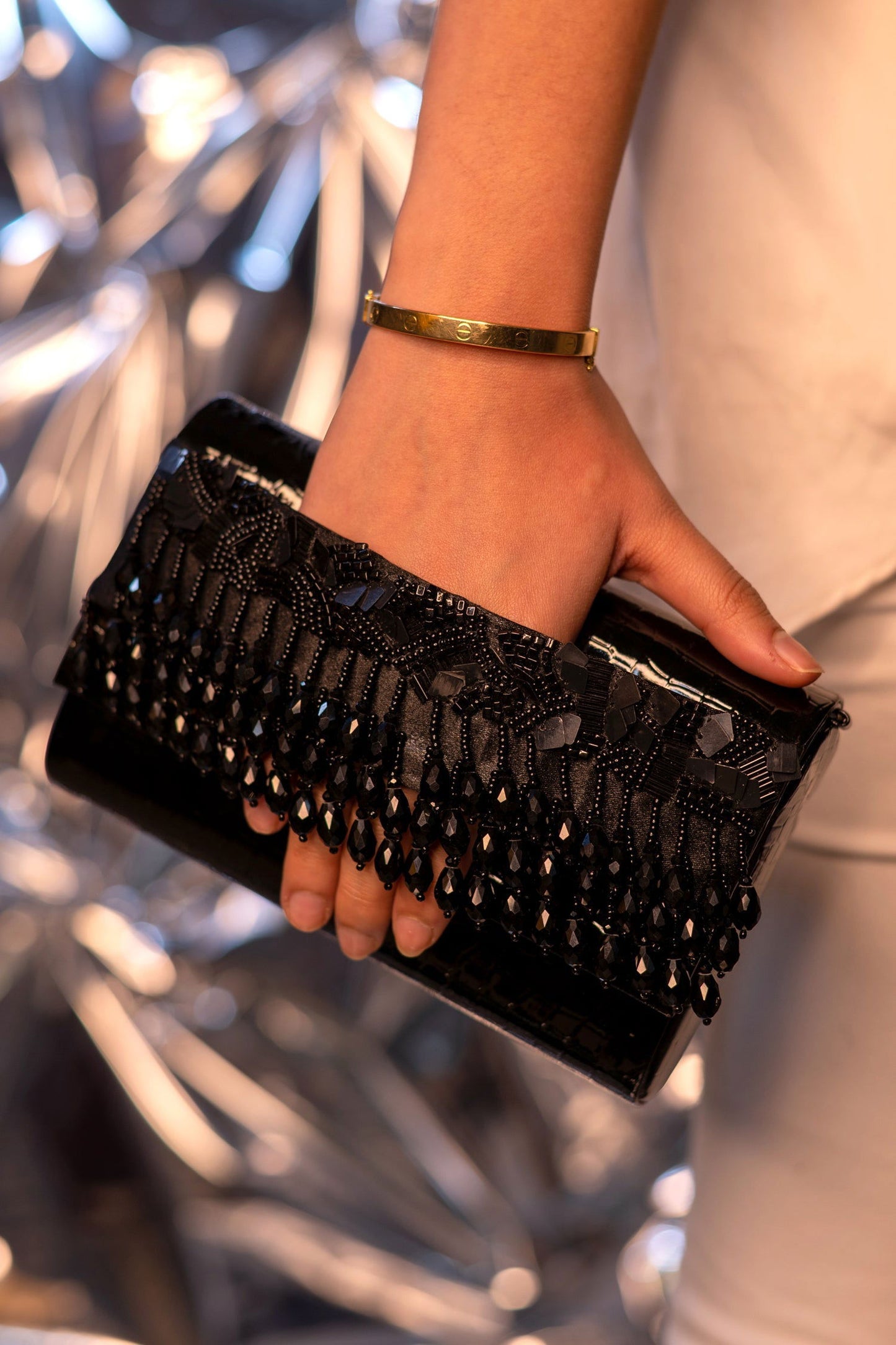 NOORIE BLACK HANDHELD CLUTCH - www.Shopthatapp.com